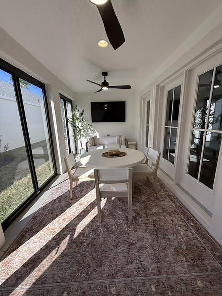 Living room with office nook and pendant lighting