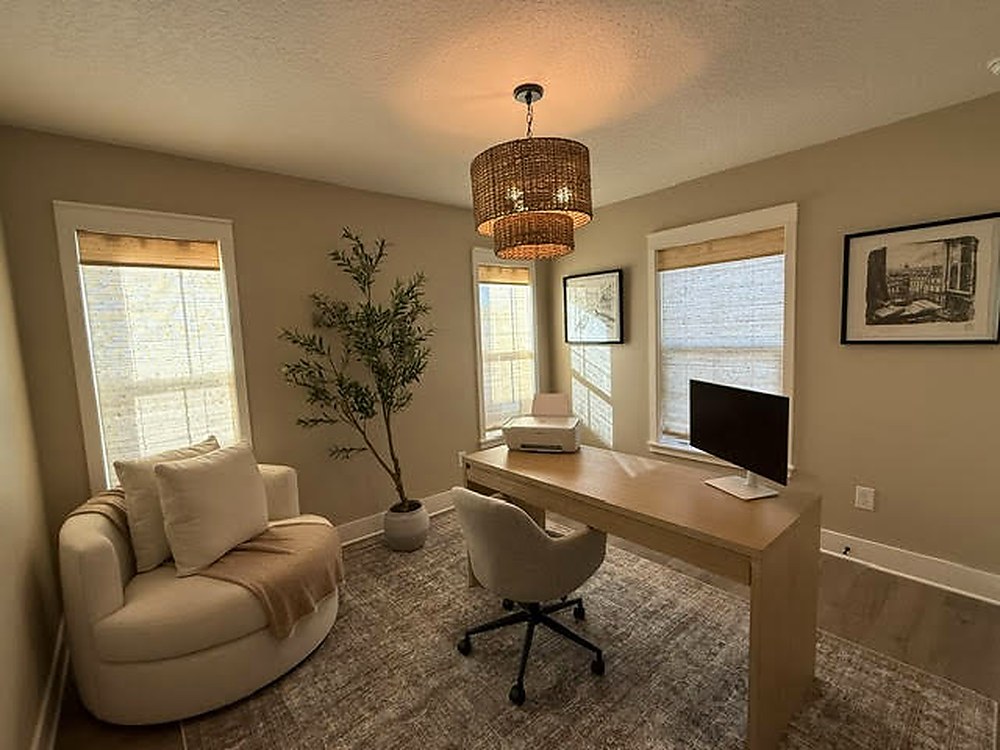 Master bedroom with natural light and neutral palette