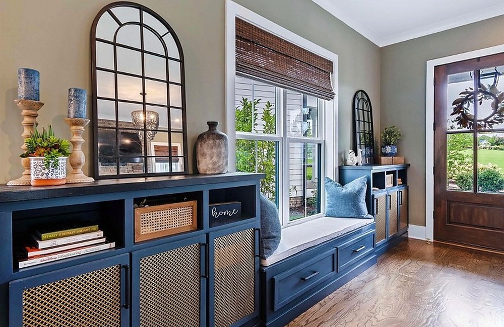 Blue built-in bench with arched window