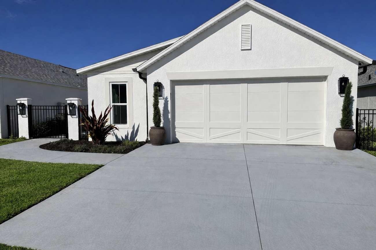 White stucco villa exterior under blue sky